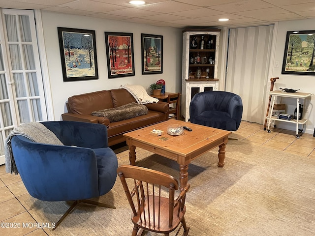 91 Center Ave, Atlantic Highlands, NJ 07716 - living area with light tile patterned floors and a paneled ceiling