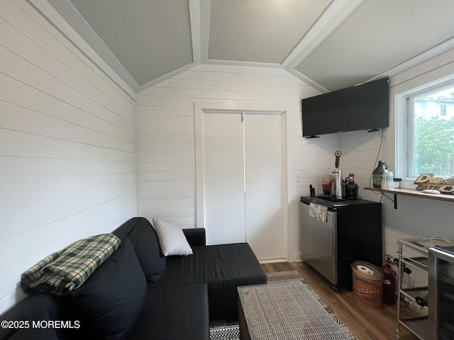 91 Center Ave, Atlantic Highlands, NJ 07716 - living room with dark wood finished floors, wooden walls, and lofted ceiling