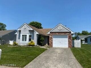 114 Mohican Ln, Little Egg Harbor, NJ 08087 - single story home featuring driveway, a front lawn, and an attached garage