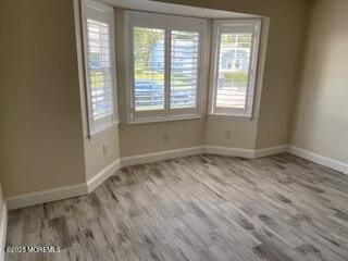 114 Mohican Ln, Little Egg Harbor, NJ 08087 - empty room with baseboards and wood finished floors