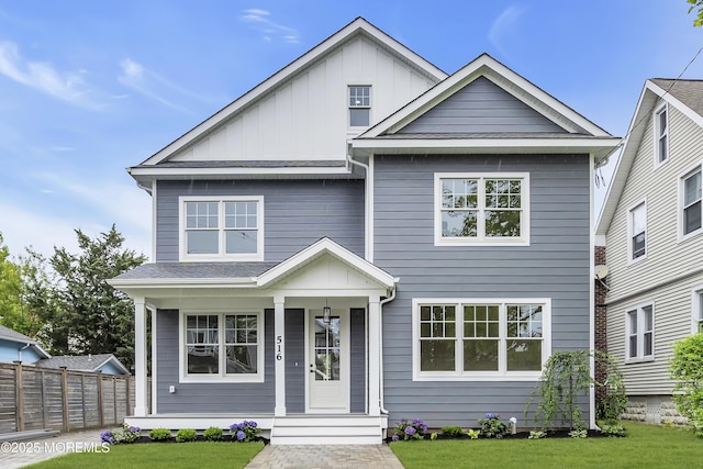 516 13th Ave, Belmar, NJ 07719 - view of front of house featuring board and batten siding and a porch