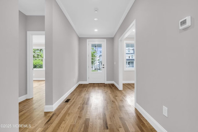 516 13th Ave, Belmar, NJ 07719 - foyer entrance with plenty of natural light, crown molding, light wood-style floors, baseboards, and recessed lighting