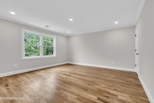 516 13th Ave, Belmar, NJ 07719 - spare room with ornamental molding, baseboards, light wood-type flooring, and recessed lighting