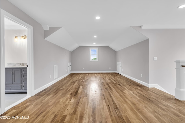 516 13th Ave, Belmar, NJ 07719 - bonus room featuring wood finished floors, vaulted ceiling, baseboards, and recessed lighting