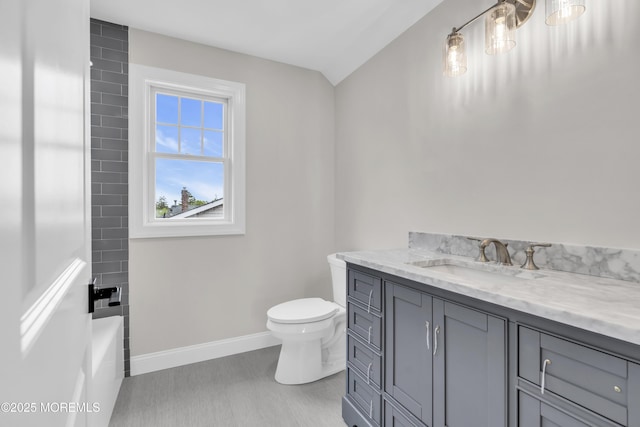 516 13th Ave, Belmar, NJ 07719 - bathroom with vanity, baseboards, and toilet