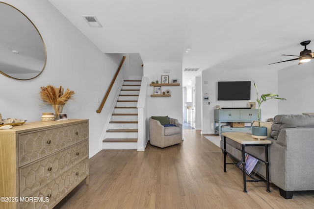 108 Drs James Parker Blvd Unit D8, Red Bank, NJ 07701 - living room featuring wood finished floors, stairway, ceiling fan, and baseboards