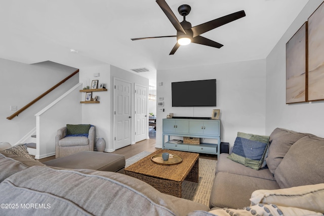 108 Drs James Parker Blvd Unit D8, Red Bank, NJ 07701 - living room featuring a ceiling fan, stairway, and wood finished floors