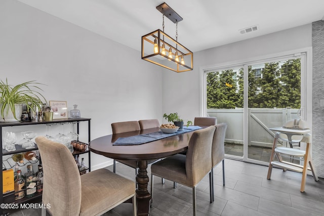 108 Drs James Parker Blvd Unit D8, Red Bank, NJ 07701 - dining area with a chandelier
