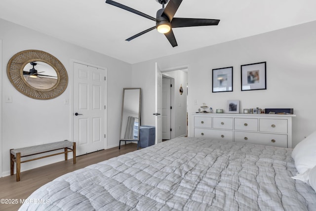 108 Drs James Parker Blvd Unit D8, Red Bank, NJ 07701 - bedroom with wood finished floors, baseboards, and ceiling fan