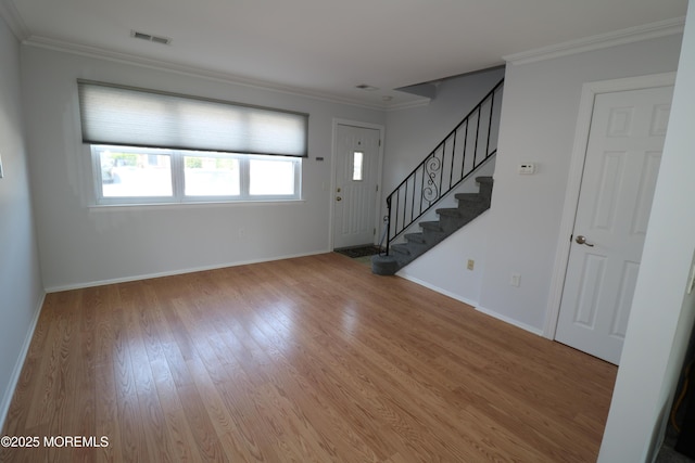 15 Iowa Ct Unit 621, Matawan, NJ 07747 - foyer featuring light wood-type flooring, stairway, and ornamental molding
