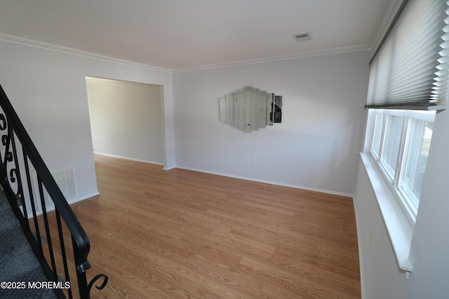 15 Iowa Ct Unit 621, Matawan, NJ 07747 - empty room with ornamental molding, light wood-type flooring, and stairway