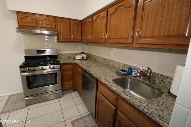 15 Iowa Ct Unit 621, Matawan, NJ 07747 - kitchen featuring stainless steel range with gas stovetop, under cabinet range hood, dishwashing machine, and tasteful backsplash