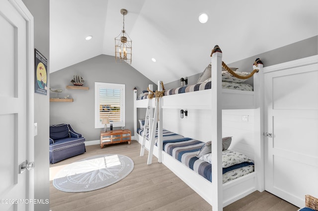 1055 Ocean Ave, Mantoloking, NJ 08738 - bedroom with lofted ceiling, wood finished floors, recessed lighting, and baseboards