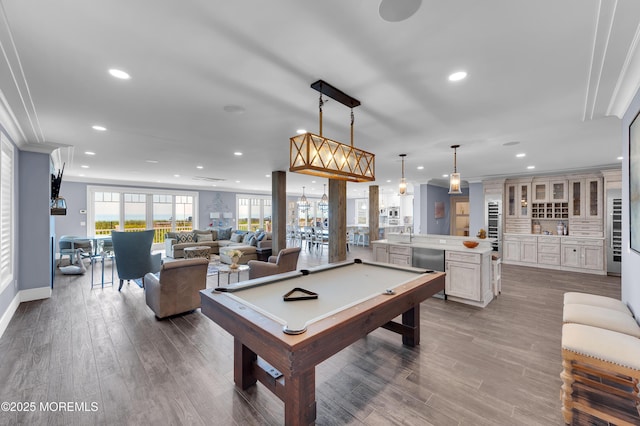 1055 Ocean Ave, Mantoloking, NJ 08738 - rec room with recessed lighting, billiards table, dark wood finished floors, crown molding, and baseboards