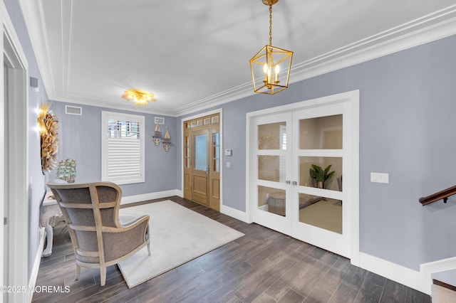 1055 Ocean Ave, Mantoloking, NJ 08738 - entrance foyer with french doors, dark wood-type flooring, a chandelier, baseboards, and crown molding