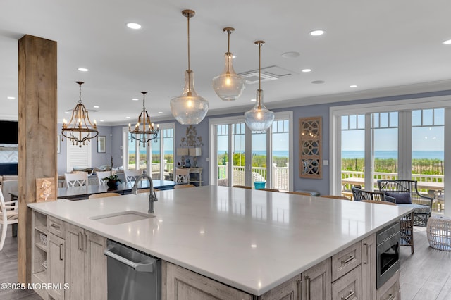 1055 Ocean Ave, Mantoloking, NJ 08738 - kitchen featuring a sink, open floor plan, stainless steel appliances, light wood-style flooring, and plenty of natural light