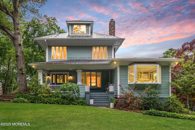 29 Grand Ave, Atlantic Highlands, NJ 07716 - traditional style home with a yard, covered porch, and a chimney