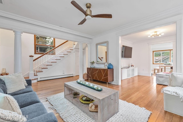 29 Grand Ave, Atlantic Highlands, NJ 07716 - living area with a baseboard radiator, stairway, ornate columns, light wood finished floors, and crown molding