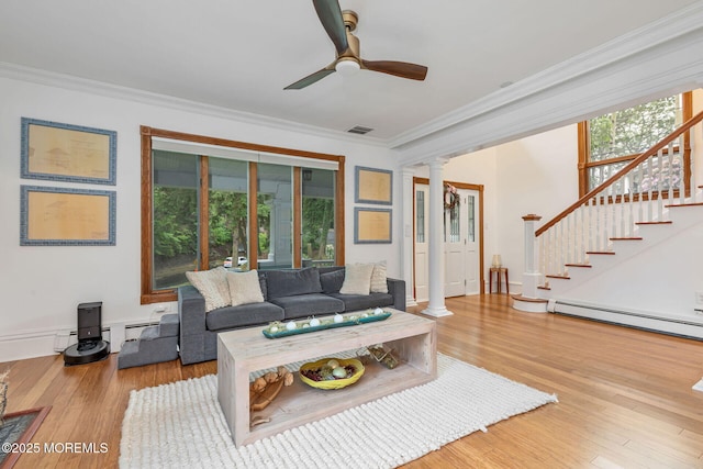 29 Grand Ave, Atlantic Highlands, NJ 07716 - living room featuring crown molding, ornate columns, stairway, a ceiling fan, and wood finished floors