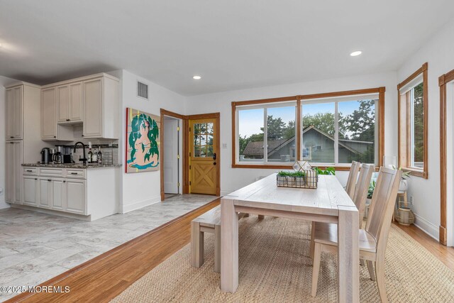 29 Grand Ave, Atlantic Highlands, NJ 07716 - dining area with healthy amount of natural light, light wood-type flooring, recessed lighting, and baseboards
