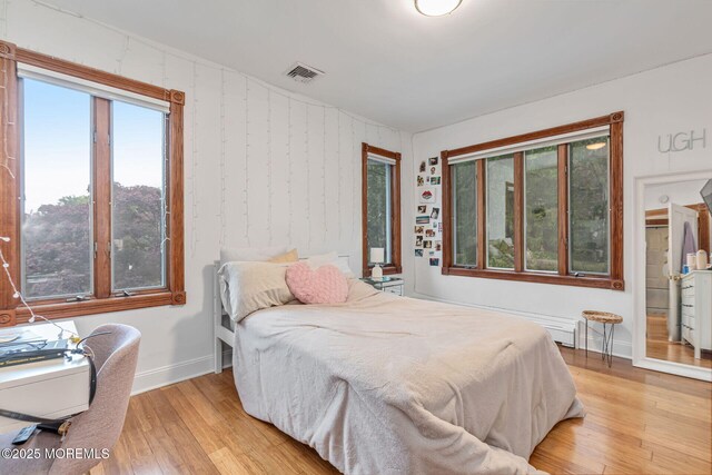 29 Grand Ave, Atlantic Highlands, NJ 07716 - bedroom featuring multiple windows, light wood finished floors, and baseboards