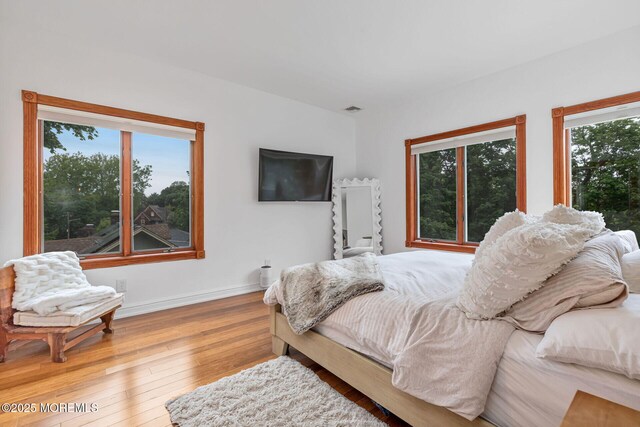 29 Grand Ave, Atlantic Highlands, NJ 07716 - bedroom with hardwood / wood-style floors and baseboards