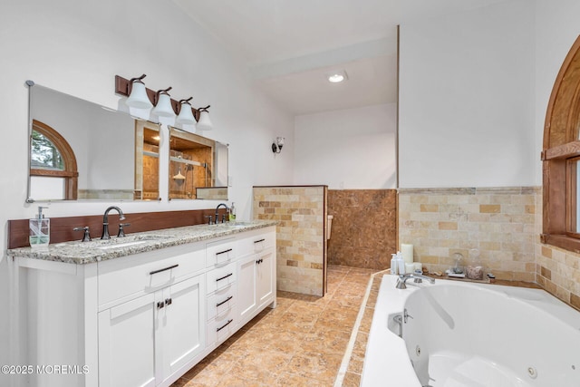 29 Grand Ave, Atlantic Highlands, NJ 07716 - bathroom featuring a tub with jets, double vanity, and tiled shower