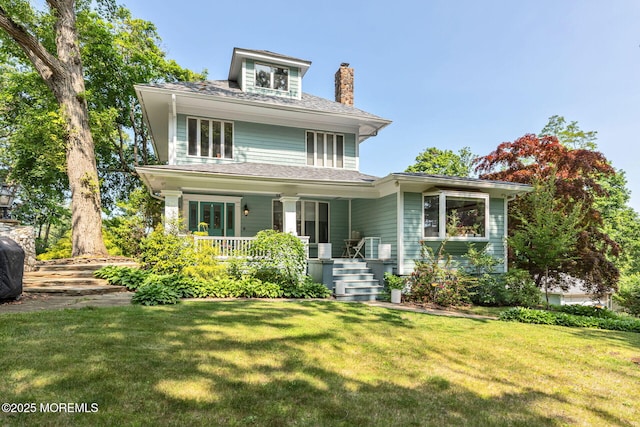 29 Grand Ave, Atlantic Highlands, NJ 07716 - traditional style home featuring a front lawn, a chimney, and a porch