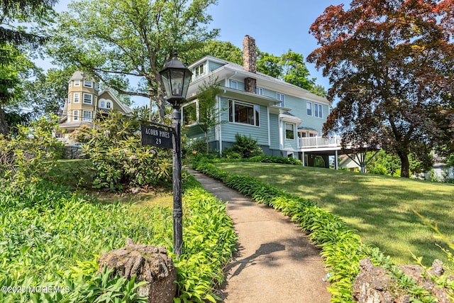 29 Grand Ave, Atlantic Highlands, NJ 07716 - back of property with a chimney and a yard