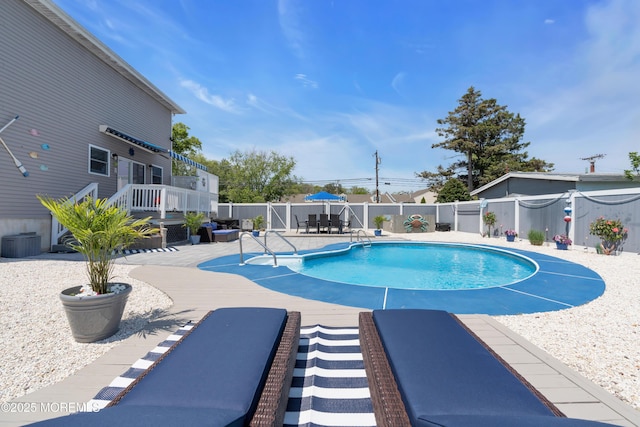 23 Charles Blvd, Manahawkin, NJ 08050 - view of swimming pool with a wooden deck, a fenced backyard, and a patio
