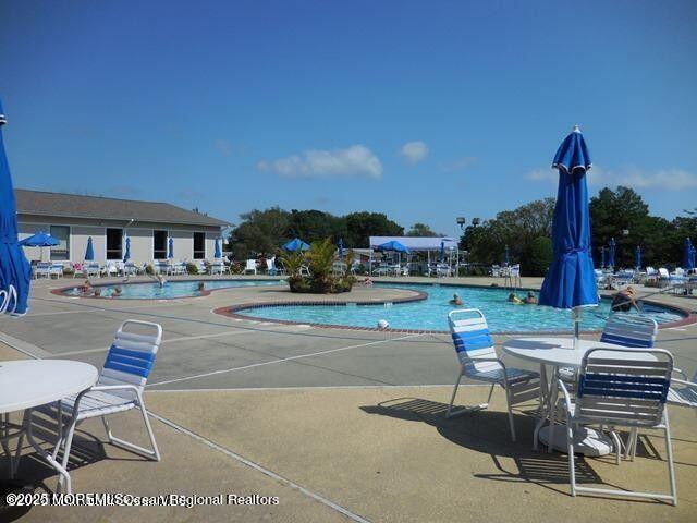 5 Spenser Ct, Brick, NJ 08724 - community pool with a patio area