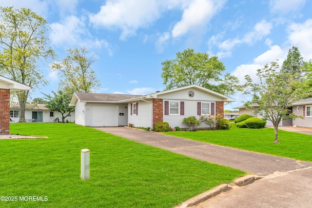 5 Spenser Ct, Brick, NJ 08724 - ranch-style house featuring a garage, a front yard, asphalt driveway, and brick siding