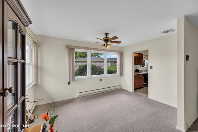 5 Spenser Ct, Brick, NJ 08724 - spare room with baseboard heating, light carpet, a ceiling fan, and baseboards