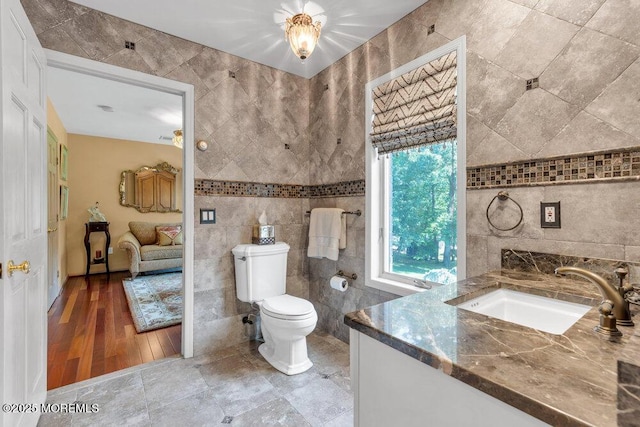 203 Stone Hill Rd, Freehold, NJ 07728 - bathroom featuring tile walls and vanity