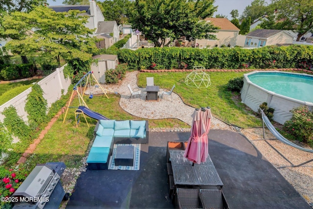 15 Transom Ln, Barnegat, NJ 08005 - fenced backyard with a patio and outdoor dining area