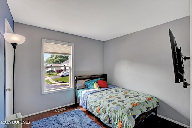 15 Transom Ln, Barnegat, NJ 08005 - bedroom with baseboards and wood finished floors