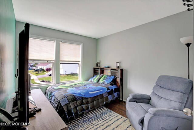 15 Transom Ln, Barnegat, NJ 08005 - bedroom with dark wood-style floors and baseboards