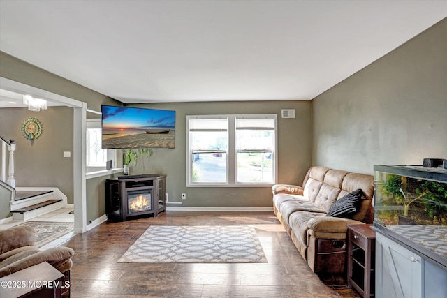 15 Transom Ln, Barnegat, NJ 08005 - living room featuring plenty of natural light, wood-type flooring, a glass covered fireplace, and baseboards