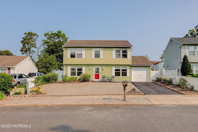 15 Transom Ln, Barnegat, NJ 08005 - colonial-style house with asphalt driveway and an attached garage