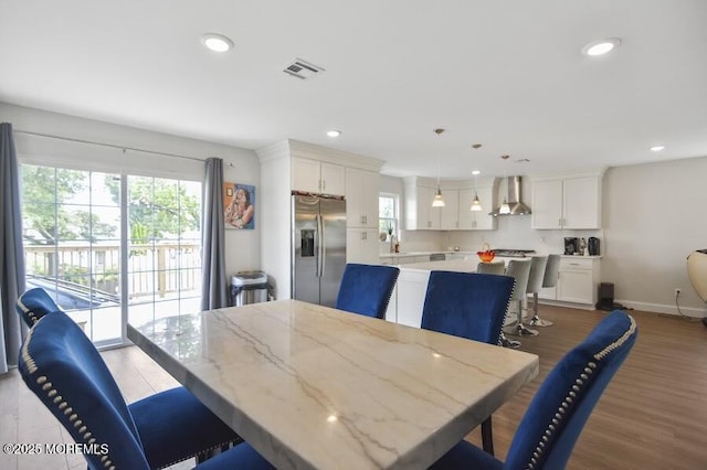 257 Port Monmouth Rd, North Middletown, NJ 07748 - dining room with healthy amount of natural light, recessed lighting, and wood finished floors
