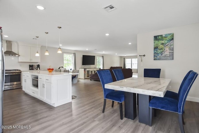 257 Port Monmouth Rd, North Middletown, NJ 07748 - dining space featuring wood finished floors and recessed lighting