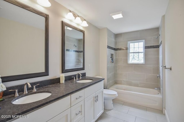 257 Port Monmouth Rd, North Middletown, NJ 07748 - bathroom with double vanity, washtub / shower combination, and tile patterned flooring