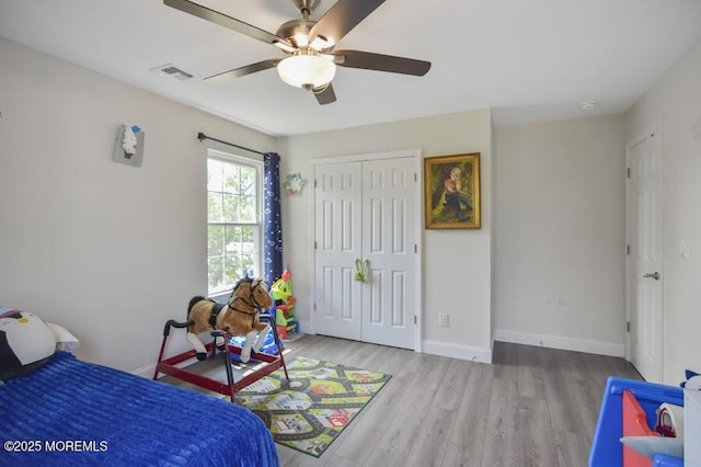 257 Port Monmouth Rd, North Middletown, NJ 07748 - bedroom with wood finished floors, a closet, and a ceiling fan