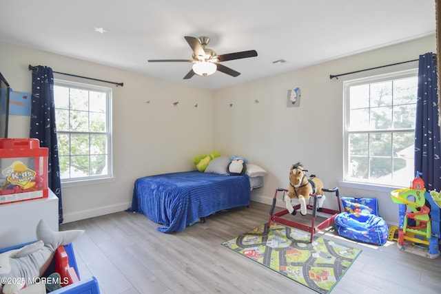 257 Port Monmouth Rd, North Middletown, NJ 07748 - bedroom with wood finished floors and a ceiling fan