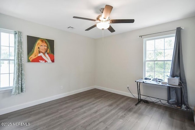 257 Port Monmouth Rd, North Middletown, NJ 07748 - empty room featuring wood finished floors and a ceiling fan