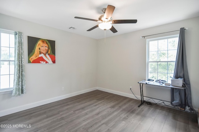 257 Port Monmouth Rd, North Middletown, NJ 07748 - unfurnished room with wood finished floors and a ceiling fan