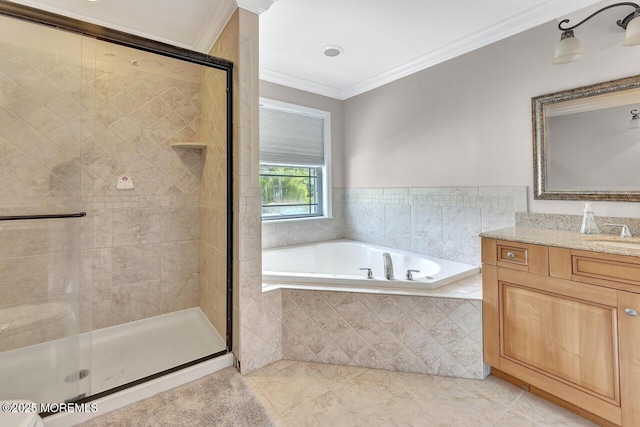 531 Parker Ave, Brick, NJ 08724 - full bathroom featuring a garden tub, vanity, a shower stall, crown molding, and tile patterned flooring