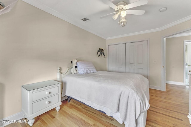 531 Parker Ave, Brick, NJ 08724 - bedroom with ornamental molding, a closet, light wood finished floors, baseboards, and a ceiling fan