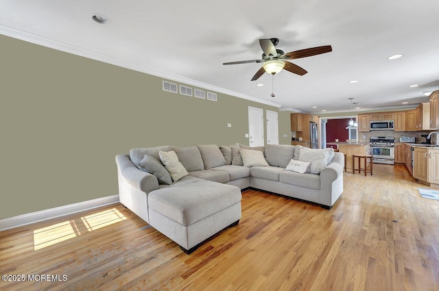 531 Parker Ave, Brick, NJ 08724 - living area featuring crown molding, a ceiling fan, light wood finished floors, recessed lighting, and baseboards