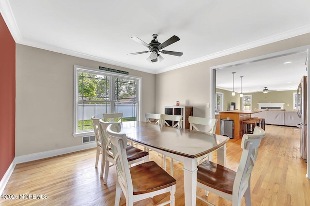 531 Parker Ave, Brick, NJ 08724 - dining space featuring a ceiling fan, light wood-style floors, baseboards, and crown molding